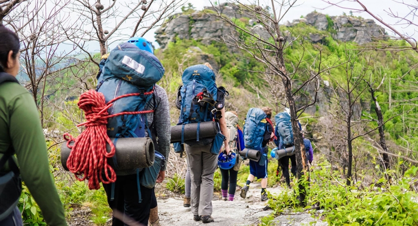 Troubled youth backpacking during outdoor education program in the Blue Ridge Mountains.  